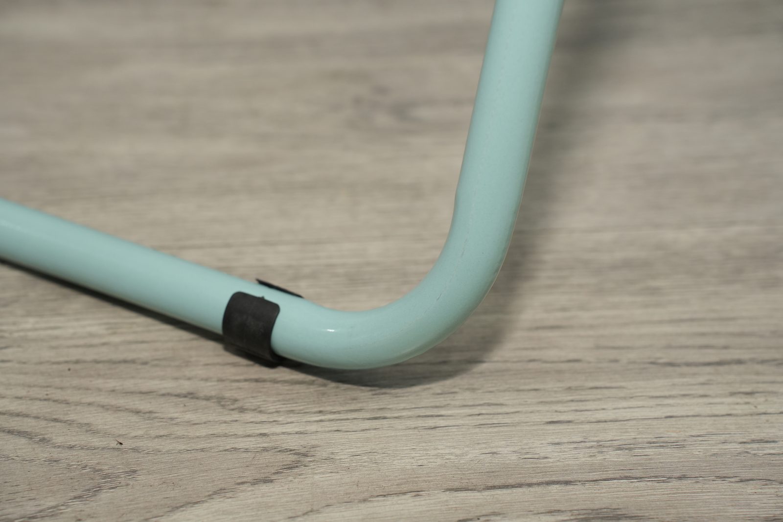 Footrest curved tube with tip sleeve